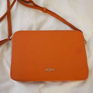 BRAND NEW TUMI CROSSCLUTCH